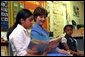 Laura Bush listens as a student at Caesar Chavez Elementary School reads during a “Ready to Read Ready to Learn” visit to the school in Hyattsville, Maryland, Feb., 26, 2001. White House photo by Carol T. Powers.