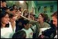 Laura Bush greets student of Morningside Elementary School after addressing the assembly in San Fernando, Calif., March 22, 2001. White House photo by Paul Morse.