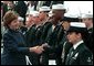 Laura Bush greets sailors aboard the USS Shiloh during a Troops to Teachers recruitment event in San Diego, March 23, 2001. White House photo by Paul Morse.