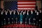 Mrs. Bush poses with the members of the U.S. Naval Academy Men’s Glee Club during the Senate Spouses luncheon at the U.S. Capitol April 3, 2001. White House photo by Susan Sterner.