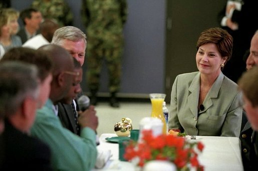 Mrs. Bush talks with teachers at Pinckney Elementary School in Columbia, South Carolina during a visit to Fort Jackson for a Troops to Teachers rally May 8, 2001. White House photo by Paul Morse.