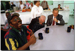 President George W. Bush visits the St. Augustine Parish Hunger Center in Cleveland Thursday, May 24. WHITE HOUSE PHOTO BY PAUL MORSE