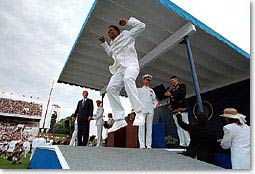 An Academy graduate leaps during graduation ceremonies. President Bush congratulated each graduate. WHITE HOUSE PHOTO BY PAUL MORSE