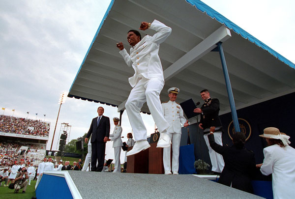 An Academy graduate leaps during graduation ceremonies. President Bush congratulated each graduate. WHITE HOUSE PHOTO BY PAUL MORSE