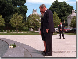 The President and Laura Bush pause before the laying of the wreath at Arlington National Cemetery on Memorial Day, Monday, May 28. WHITE HOUSE PHOTO BY SUSAN STERNER