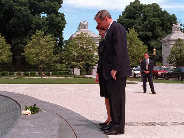 The President and Laura Bush pause before the laying of the wreath at Arlington National Cemetery on Memorial Day, Monday, May 28. WHITE HOUSE PHOTO BY SUSAN STERNER