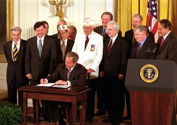 President George W. Bush signs a bill to build a memorial to World War II veterans, Monday, May 28 at the White House. WHITE HOUSE PHOTO BY TARA INGBERG