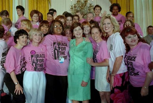 Mrs. Bush is surrounded by breast cancer survivors during a Race for the Cure event held at the White House June 1, 2001. White House photo by Susan Sterner.