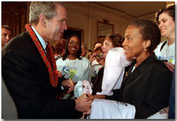 President George W. Bush greets those attending the Race For Cure Survivors event at the White House Friday, June. 1. WHITE HOUSE PHOTO BY TARA ENGBERG