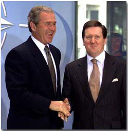 NATO Secretary-General George Robertson greets President George W. Bush at NATO headquarters in Brussels, Belgium on June 13, 2001. WHITE HOUSE PHOTO BY PAUL MORSE