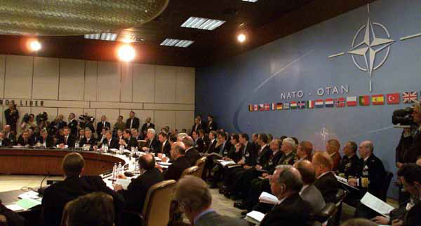 President George W. Bush speaks at the Secretary General’s office at NATO headquarters in Brussels, Belgium on June 13, 2001. WHITE HOUSE PHOTO BY PAUL MORSE