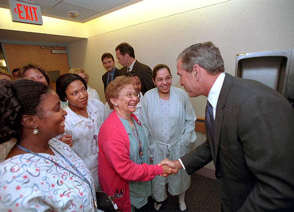 President Bush greets some of the staff and patients at Inova Fair Oaks Hospital July 3, 2001. The President and Mrs. Bush were at the hospital visiting Desiree and Stephen Sayle, who were celebrating the birth of their second daughter, Vivienne. White House photo by Eric Draper.