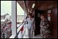 Laura Bush attends the Dedication of the Laura Bush Center for Education at Camp Bondsteel July 24, 2001 in Kosovo, Federal Republic of Yugoslavia. White House photo by Moreen Ishikawa.