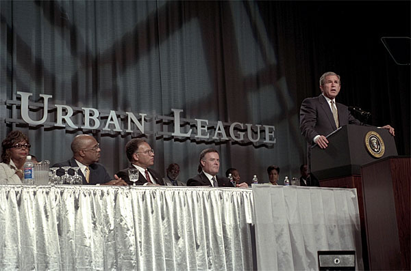 Speaking at the Washington Convention Center, President Bush addresses the 2001 Urban League Conference Wednesday, August 1, 2001. "We owe all our children the pride and promise of learning. We must return the spirit of ambition and achievement to all our public schools," said the President during his remarks. "The Urban League is reaching toward that goal by highlighting student achievement, by focusing on early literacy, by encouraging every child to read and rise. And our government must have those same priorities.". White House photo by Moreen Ishikawa.