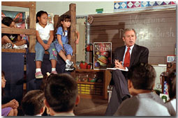 President Bush visits with a second-grade class at Griegos Elementary School in Albuquerque, N. M, Aug. 15. White House photo by Moreen Ishikawa.