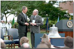 Stories were exchanged and as President Bush presented Australian Prime Minister Howard with the bell from the U.S.S. Canberra at a ceremony commemorating 50 years of military alliance. "The President had received word of an exceptional action in battle by the Australian Navy, which were steaming alongside American vessels at Guadalcanal. His Majesty's Australian ship Canberra did not survive the battle, disappearing into the depths where she rests today," explained the President. White House photo by Tina Hager.