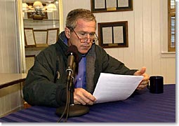 President George W. Bush delivers his weekly radio address to the nation from Camp David, Saturday, Sept. 15, 2001. White House photo by Eric Draper.