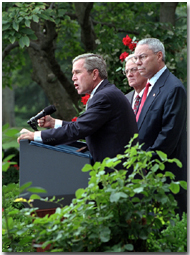 "Today, we have launched a strike on the financial foundation of the global terror network," stated the President in the Rose Garden as he, Secretary of the Treasury Paul O'Neill and Secretary of State Colin Powell address the media Sept. 24. White House photo by Tina Hager.