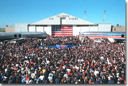 Airline employees crowd together on the tarmac at Chicago's O'Hare International Airport to meet President Bush and honor their industry colleagues Sept. 27. "I think it's interesting that on one side, we see American; on the other side, it says United," said the President in his remarks. "Because that's what we are -- America is united.". White House photo by Paul Morse.