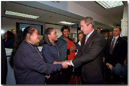 Federal Emergency Management Agency employees greet President Bush during his visit to the agency's headquarters to thank them for recent days of hard work Oct. 1. "I'm proud of the work that the FEMA employees all across the country are doing on behalf of America," said the President in his remarks. White House photo by Tina Hager.