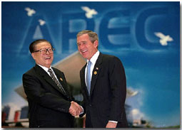 President George W. Bush and Chinese President Jiang Zemin deliver a joint statement to the media in Shanghai, People's Republic of China, Oct. 19. White House photo by Eric Draper.