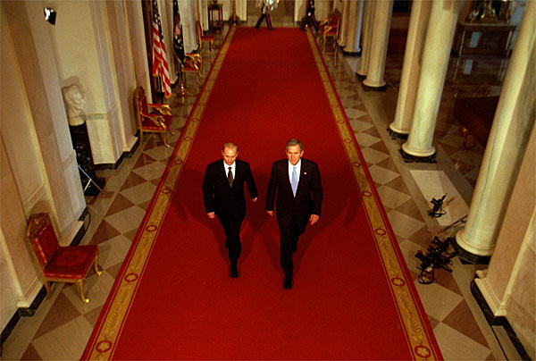 President George W. Bush and Russian President Vladimir Putin walk out to address the media at the White House Nov. 13. "This is a new day in the long history of Russian-American relations, a day of progress and a day of hope," said President Bush in his remarks. White House photo by Paul Morse.