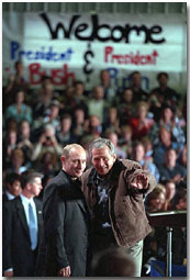 President George W. Bush and Russian President Vladimir Putin answer questions from students at Crawford High School Nov. 15. "When I was in high school, Russia was an enemy," said President Bush. "Now the high school students can know Russia as a friend; that we're working together to break the old ties, to establish a new spirit of cooperation and trust so that we can work together to make the world more peaceful.". White House photo by Paul Morse.