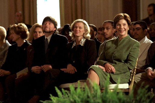 Hosting the Mark Twain Symposium, Laura Bush sits with documentary filmmaker Ken Burns in the East Room Nov. 29, 2001. White House photo by Susan Sterner