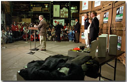 "There have been bake sales and there have been lemonade stands; and there are empty piggy banks and there have been all kinds of drives to raise money for the Afghan children," said President George W. Bush at the Church of the Brethren Warehouse New Windsor, Maryland Dec. 8. Children from across the country donated their efforts and dollars to buy clothing, toys, school and other supplies. White House photo by Paul Morse.