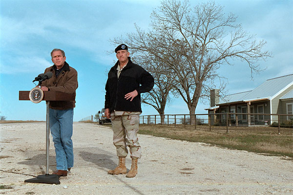 President George W. Bush and Army General Tommy Franks talk with the press in Crawford, Texas, December 28. White House photo by Susan Sterner.