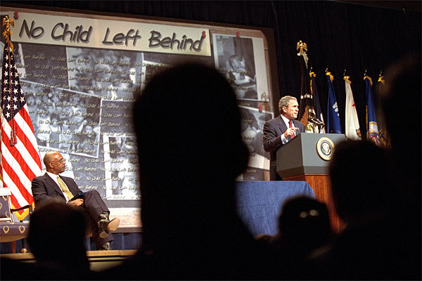 "The No Child Left Behind Act provides new training opportunities for teachers to develop their professional skills and their knowledge," said President George W. Bush during an education rally at the Daughters of the American Revolution (DAR) Constitution Hall in Washington, D.C., Jan. 9. On stage with President Bush is Secretary of Education Rod Paige (far left) and Congressmen Rep. George Miller, U.S. Sen. Edward Kennedy and Rep. John Boehner (none are pictured). White House photo by Tina Hager.