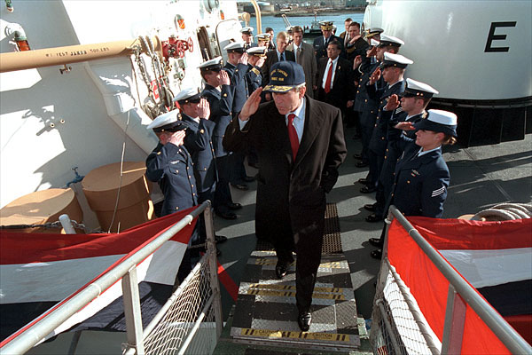 President Bush salutes as he disembarks the ship after his tour Jan. 25. "When it comes to securing our homeland, and helping people along the coast, the Coast Guard has got a vital and significant mission," said the President in his remarks at nearby Southern Maine Technical College. "And, therefore, the budget that I send to the United States Congress will have the largest increase in spending for the Coast Guard in our nation's history." White House photo by Eric Draper.