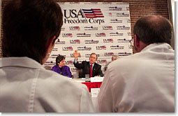 President George W. Bush talks with local police, fire, health and government officials during a roundtable meeting at the Center for Community Safety at Winston-Salem State University, Wednesday, Jan 30, 2002. White House photo by Eric Draper.