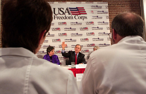 President George W. Bush talks with local police, fire, health and government officials during a roundtable meeting at the Center for Community Safety at Winston-Salem State University, Wednesday, Jan 30, 2002. White House photo by Eric Draper.