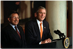 President Bush and Pakistani President Pervez Musharraf address the media in Cross Hall, Feb. 13. "The forces of history have accelerated the growth of friendship between the United States and Pakistan," said President Bush. Click here to view webcast. White House photo by Susan Sterner.