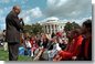 Secretary of Education Roderick Paige reads to children during on of the many story book hours at the Annual Easter Egg Roll on the South Lawn of the White House April 1. Other readers including Laura Bush, Secretary of Transportation Norm Mineta and Marc Brown, children's book author of Arthur Meets the President. White House photo by Evan Parker.