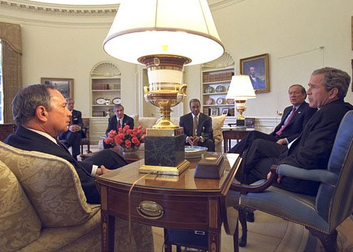 President George W. Bush meets with New York Governor George Pataki, right, and Mayor Michael Bloomberg in the Oval Office Monday, April 1. During their meeting, the president announced that New York's Governors Island will be transferred from federal to local state government. White House photo by Tina Hager.