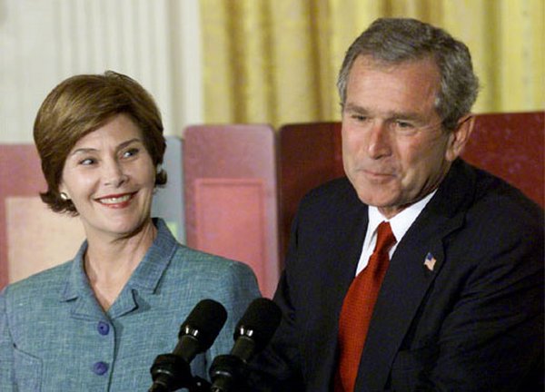 President George W. Bush and Laura Bush discuss the importance of involving families and teachers to help children read at an early age in the East Room Wednesday, April 3. Promoting the Early Childhood Education Initiative, Mrs. Bush is the honorary national chairperson of the PBS Designated Reader campaign. After their remarks, the audience of adults and children were visited by Mister Rogers and Elmo from Sesame Street. White House photo by Evan Parker.