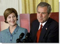 President George W. Bush and Laura Bush discuss the importance of involving families and teachers to help children read at an early age in the East Room Wednesday, April 3. Promoting the Early Childhood Education Initiative, Mrs. Bush is the honorary national chairperson of the PBS Designated Reader campaign. After their remarks, the audience of adults and children were visited by Mister Rogers and Elmo from Sesame Street. White House photo by Evan Parker.