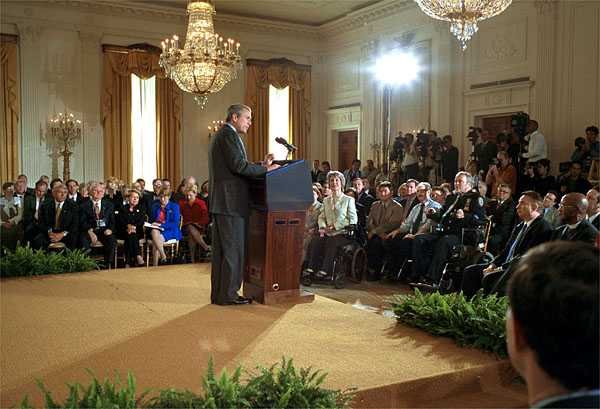 President George W. Bush calls on the Senate to support a ban on human cloning during an address in the East Room Wednesday, April 10. "Our age must also be defined by the care and restraint and responsibility with which we take up these new scientific powers," said the President. "Advances in biomedical technology must never come at the expense of human conscience." White House photo by Paul Morse.