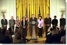 Introduced by Secretary of Labor Elaine Chao (pictured to the immediate right of the President), President George W. Bush addressed the audience during a ceremony for the Recovery and Empowerment Act, which aid charitable efforts, in the East Room Thursday, April 11. White House photo by Eric Draper.