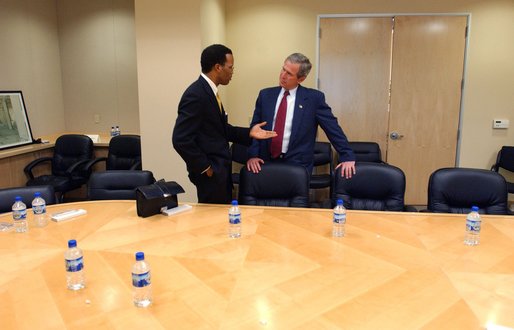 President George W. Bush meets one-on-one with John Bryant, Founder, Chairman and CEO of Operation HOPE, after a roundtable discussion with community leaders at First African Methodist Episcopal Renaissance Center in Los Angeles, Calif., Monday, April 29. White House photo by Eric Draper.