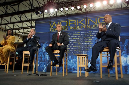 President George W. Bush discusses welfare reform during a trip to Chicago, Ill., Monday, May 13. "It is essential that a central component of that bill be work," said the President. "We must set high standards. Over the next five years, the states, and working with the local governments, ought to place 70 percent of the people into a job." White House photo by Paul Morse.