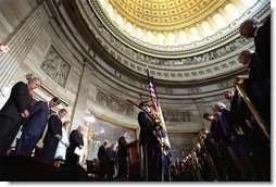 Rev. Daniel P. Coughlin leads the President and guests in prayer at the beginning of the Gold Medal ceremony. "President Reagan believed deeply in American character and destiny," said President Bush. "He believed deeply in the power of freedom to improve the lives of average men and women. These ideas changed America, and they changed the world. Not only because he eloquently explained them, because they are right and they are true." White House photo by Tina Hager.