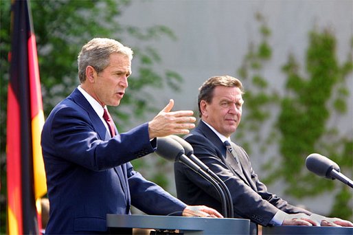 President George W. Bush and German Chancellor Gerhard Schroeder participate in a press conference in the courtyard of Kanzleramt-Chancellery Building in Berlin, Germany, Thursday, May 23. White House photo by Paul Morse.