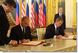 President George W. Bush and Russian President Vladimir Putin sign an arms reduction treaty at the Kremlin in Moscow, Russia on May 24, 2002. White House photo by Paul Morse.