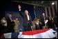 President George W. Bush addresses the World Pork Expo in Des Moines, Iowa, Friday, June 7, 2002. 