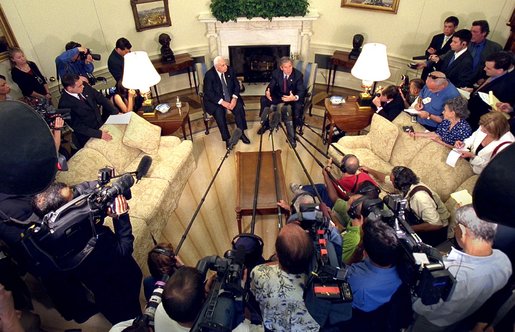 President George W. Bush talks to the White House Press pool after his meeting with Israeli Prime Minister Ariel Sharon inside the Oval Office, Monday, June 10. White House photo by Eric Draper.