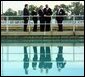 President George W. Bush tours the Kansas City Water treatment plant Tuesday, June 11. He is accompanied by Tom Ridge, Director of the Homeland Security Council, far left; Christie Todd Whitman, Administrator of the Environmental Protection Agency, center left; Mr. Gurnie Gunter, Director Of Water and Pollution Control for the city of Kansas City, Mo., center right; and John Reddy, Director Of Water Treatment Services. White House photo by Paul Morse.