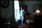 Laura Bush walks through the home of author Katherine Anne Porter in Kyle, Texas, June 13, 2002. White House photo by Tina Hager